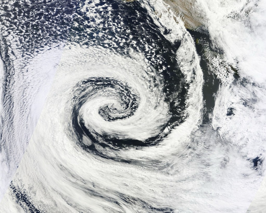Satellite image of the clock-wise rotation of the typhoons located in the southern hemisphere